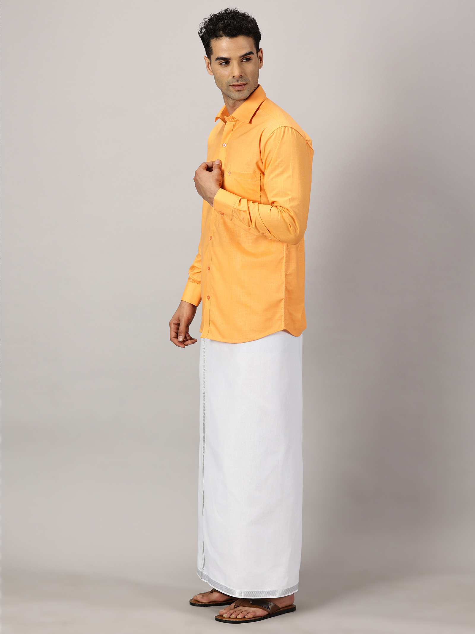 1. Men’s Full Sleeve Shirt Cotton& Dhoti Silver Zari - Combo Set -Saffron - XL Our traditional cotton shirts paired with dhotis bring together heritage and style. Tailored for comfort and crafted for cultural pride, they redefine ethnic elegance.