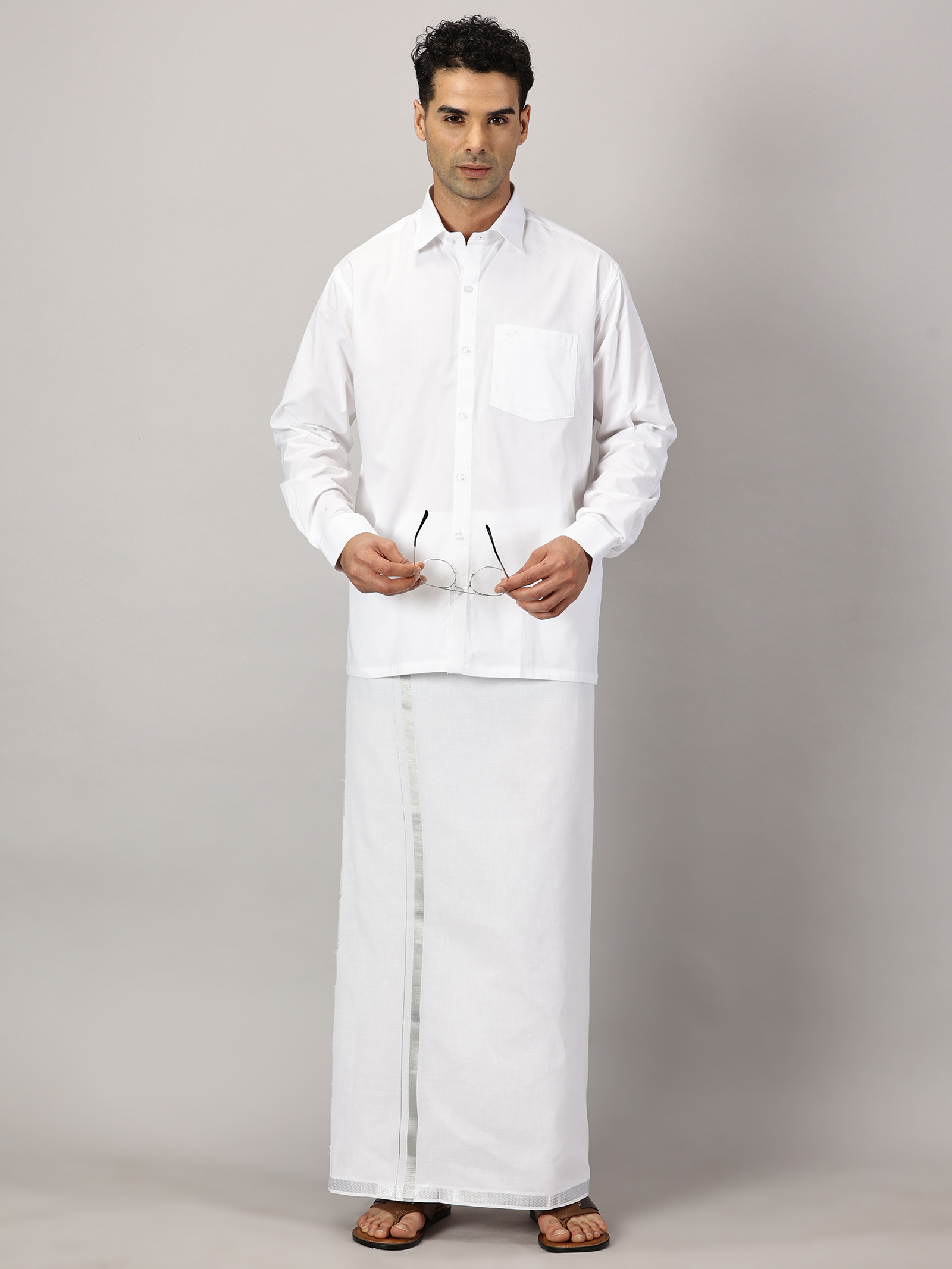 1. Men’s Full Sleeve Shirt Cotton & Dhoti Silver Zari - Combo Set -White - L Our traditional cotton shirts paired with dhotis bring together heritage and style. Tailored for comfort and crafted for cultural pride, they redefine ethnic elegance.