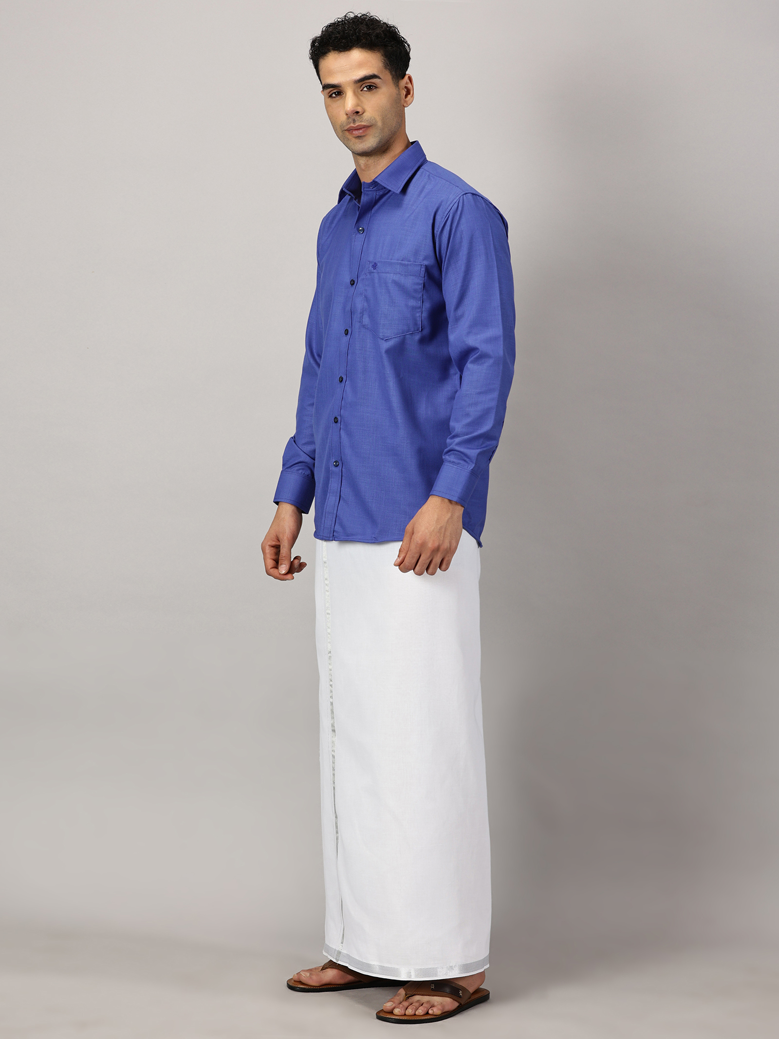1. Men’s Full Sleeve Shirt Cotton & Dhoti Silver Zari - Combo Set -Cobalt - XXL Our traditional cotton shirts paired with dhotis bring together heritage and style. Tailored for comfort and crafted for cultural pride, they redefine ethnic elegance.