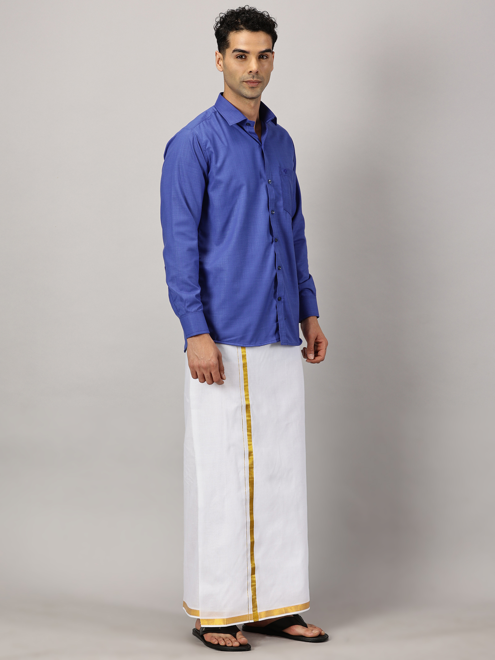 1. Men’s Full Sleeve Shirt Cotton & Dhoti Gold Zari - Combo Set -Cobalt - L Our traditional cotton shirts paired with dhotis bring together heritage and style. Tailored for comfort and crafted for cultural pride, they redefine ethnic elegance.