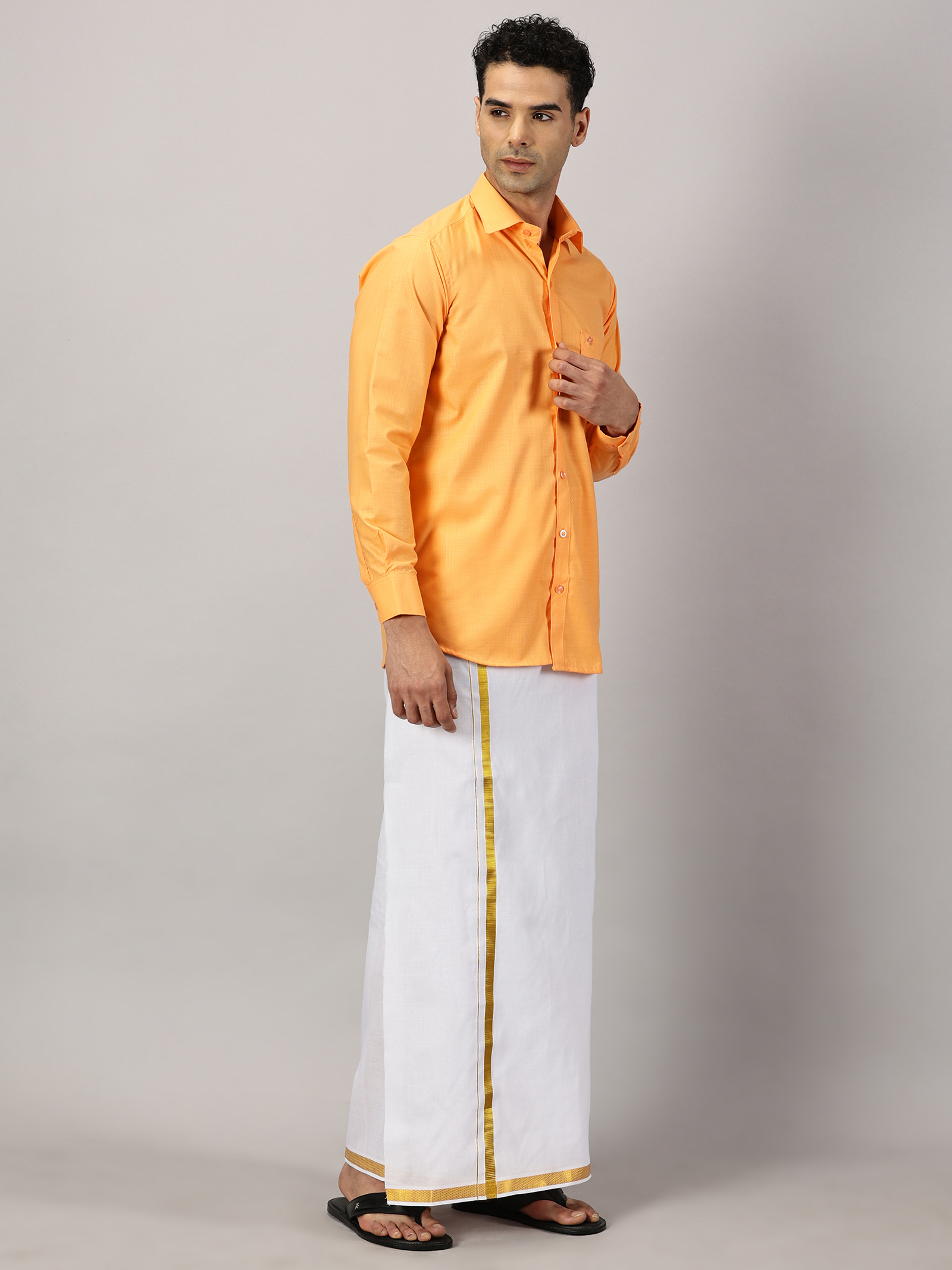 1. Men’s Full Sleeve Shirt Cotton & Dhoti Gold Zari - Combo Set -Saffron - XL Our traditional cotton shirts paired with dhotis bring together heritage and style. Tailored for comfort and crafted for cultural pride, they redefine ethnic elegance.
