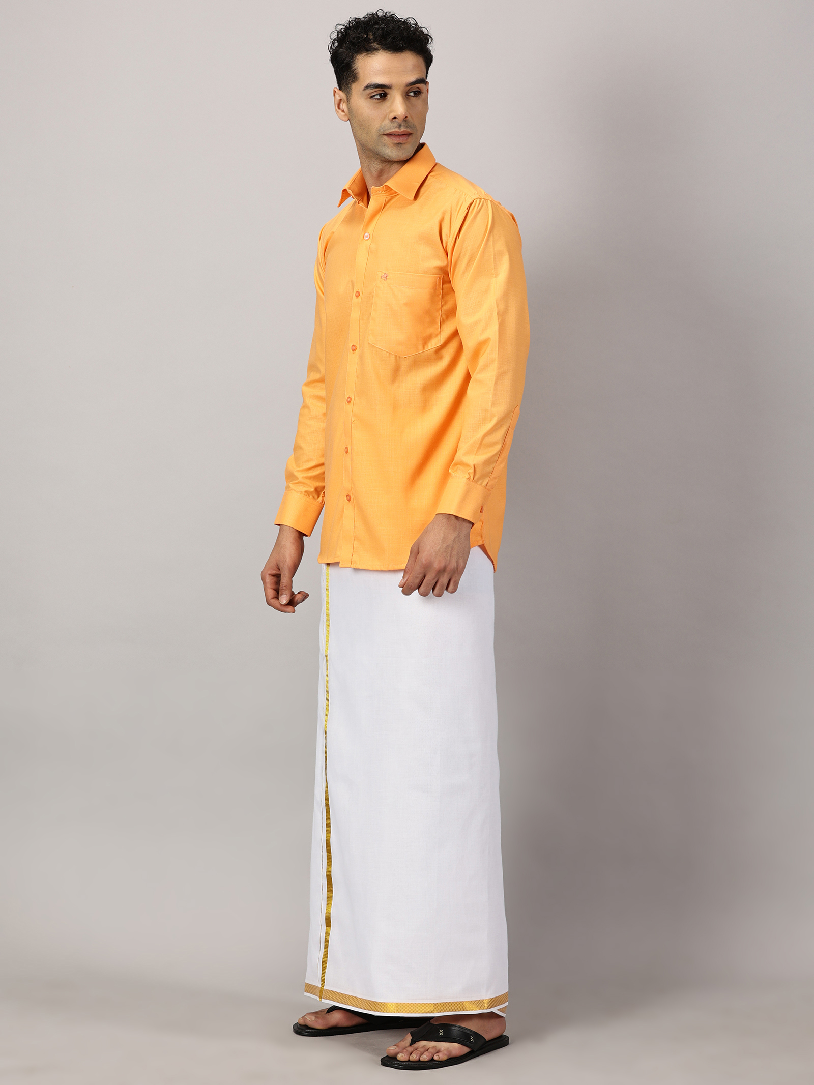 1. Men’s Full Sleeve Shirt Cotton & Dhoti Gold Zari - Combo Set -Saffron - XL Our traditional cotton shirts paired with dhotis bring together heritage and style. Tailored for comfort and crafted for cultural pride, they redefine ethnic elegance.