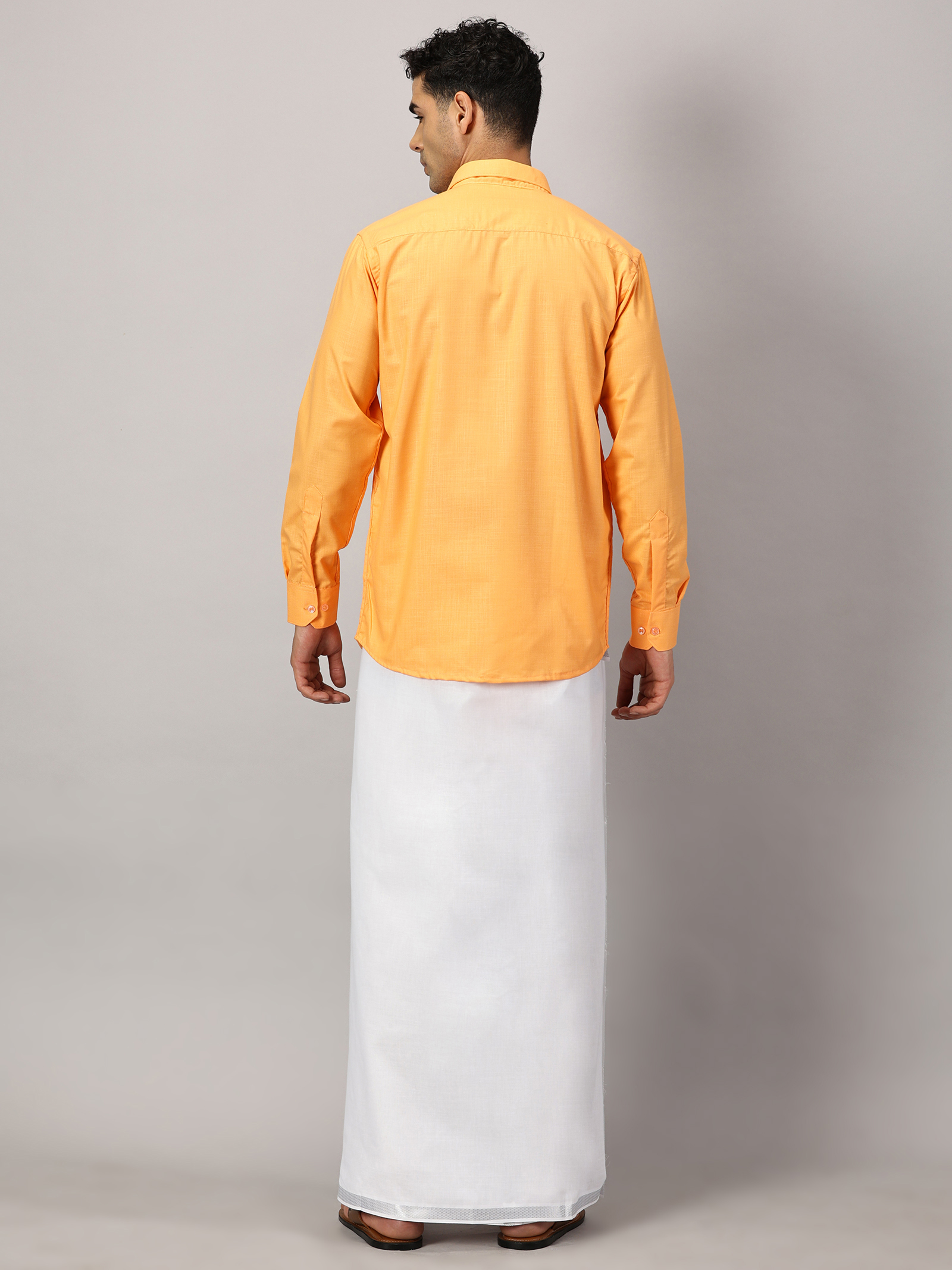 1. Men’s Full Sleeve Shirt Cotton& Dhoti Silver Zari - Combo Set -Saffron - XL Our traditional cotton shirts paired with dhotis bring together heritage and style. Tailored for comfort and crafted for cultural pride, they redefine ethnic elegance.