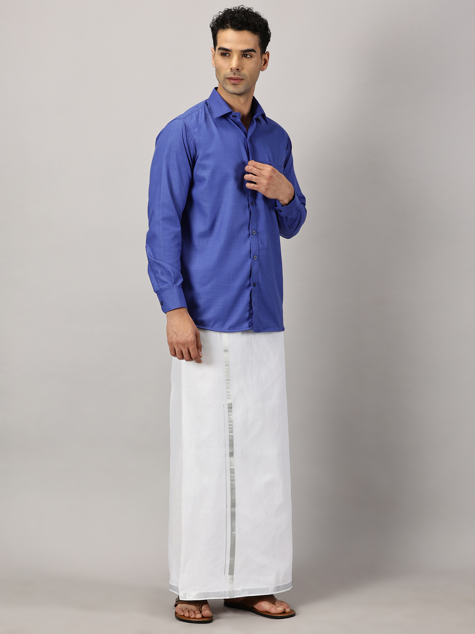 1. Men’s Full Sleeve Shirt Cotton & Dhoti Silver Zari - Combo Set -Cobalt - XXL Our traditional cotton shirts paired with dhotis bring together heritage and style. Tailored for comfort and crafted for cultural pride, they redefine ethnic elegance.