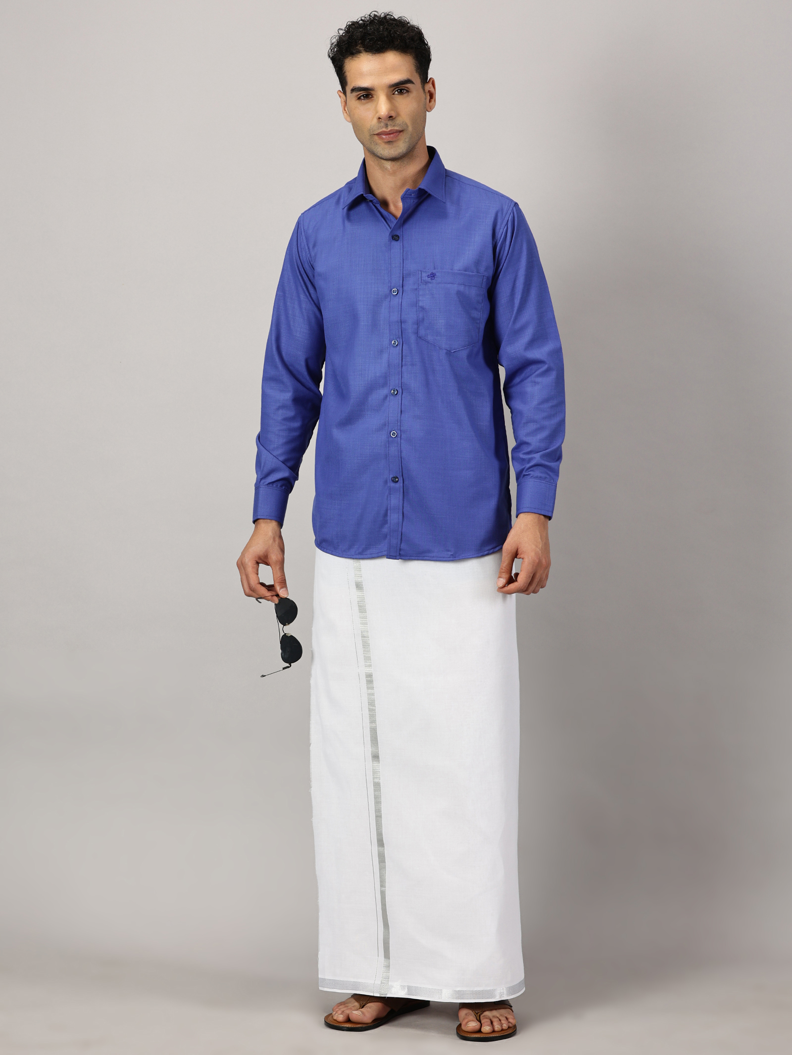 1. Men’s Full Sleeve Shirt Cotton & Dhoti Silver Zari - Combo Set -Cobalt - L Our traditional cotton shirts paired with dhotis bring together heritage and style. Tailored for comfort and crafted for cultural pride, they redefine ethnic elegance.