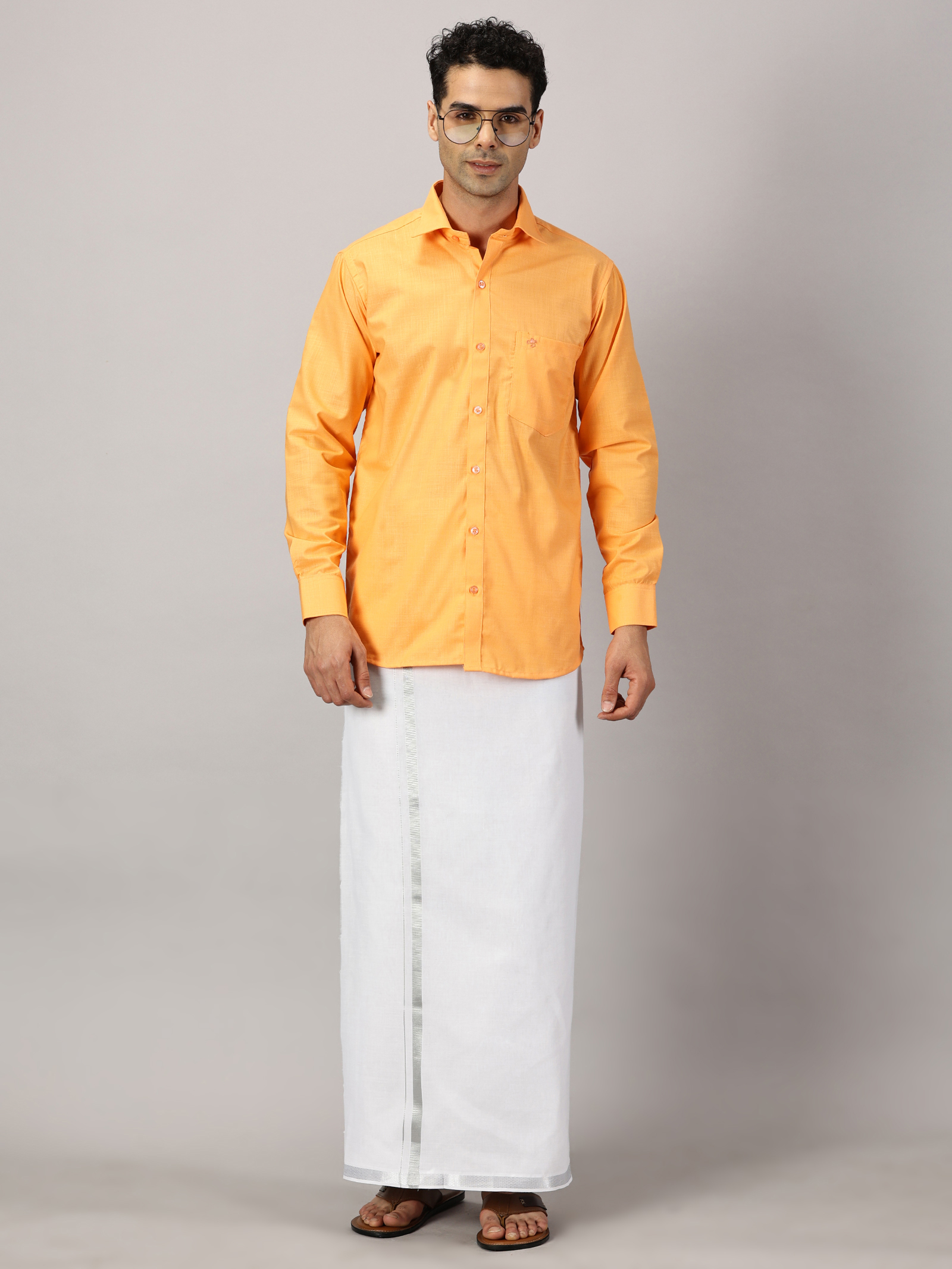 1. Men’s Full Sleeve Shirt Cotton& Dhoti Silver Zari - Combo Set -Saffron - L Our traditional cotton shirts paired with dhotis bring together heritage and style. Tailored for comfort and crafted for cultural pride, they redefine ethnic elegance.