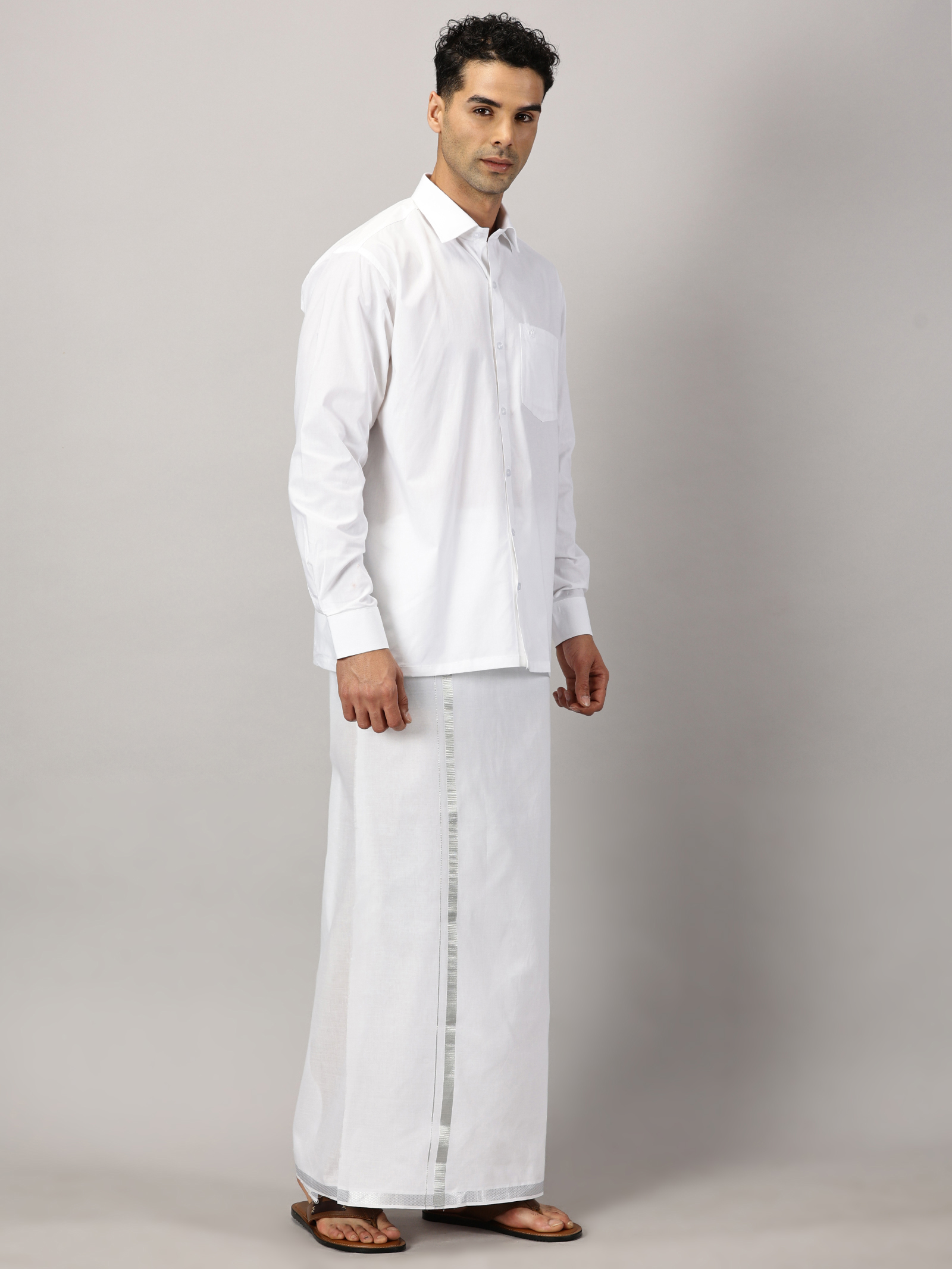 1. Men’s Full Sleeve Shirt Cotton & Dhoti Silver Zari - Combo Set -White - XXL Our traditional cotton shirts paired with dhotis bring together heritage and style. Tailored for comfort and crafted for cultural pride, they redefine ethnic elegance.