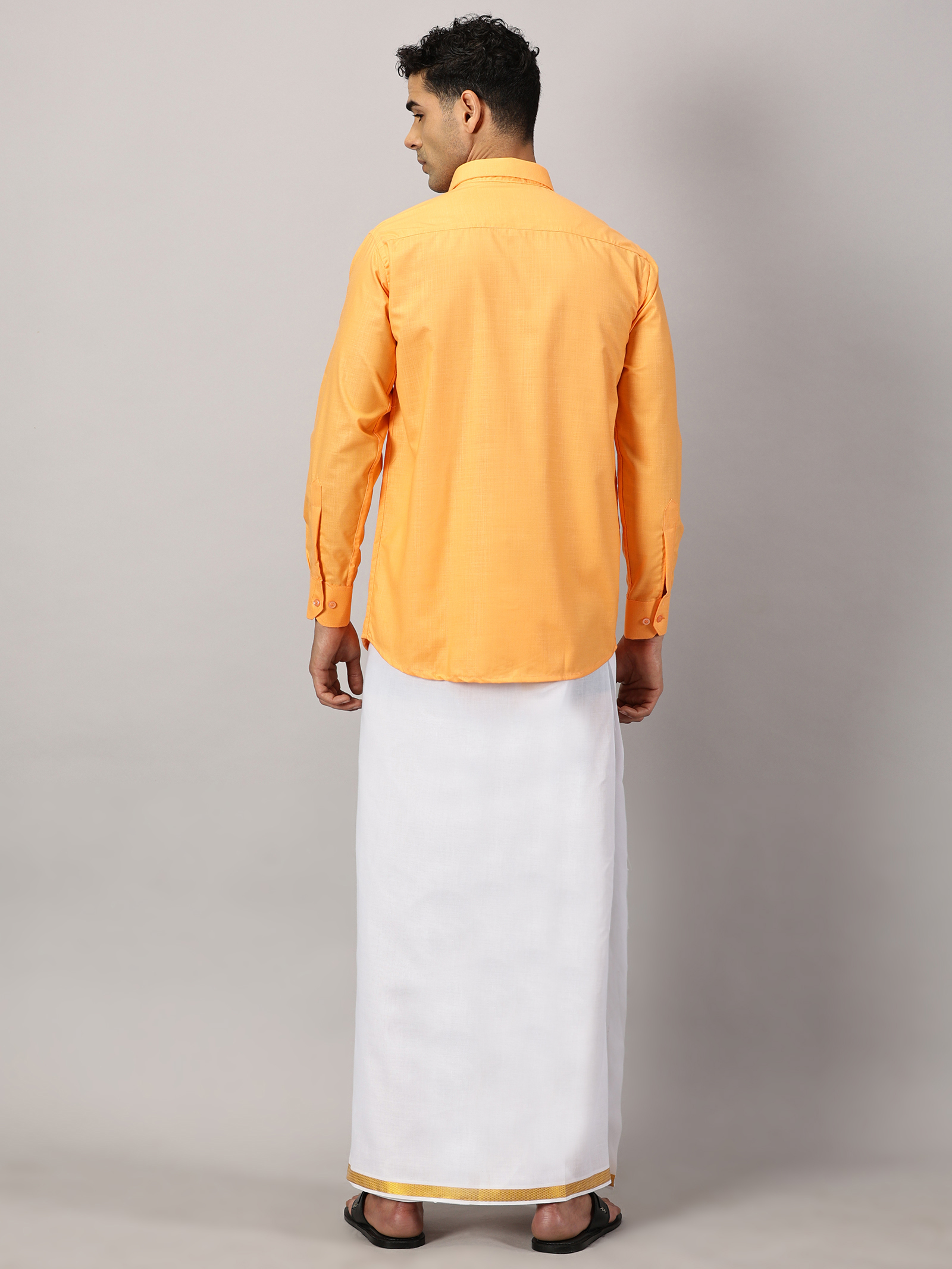 1. Men’s Full Sleeve Shirt Cotton & Dhoti Gold Zari - Combo Set -Saffron - XL Our traditional cotton shirts paired with dhotis bring together heritage and style. Tailored for comfort and crafted for cultural pride, they redefine ethnic elegance.